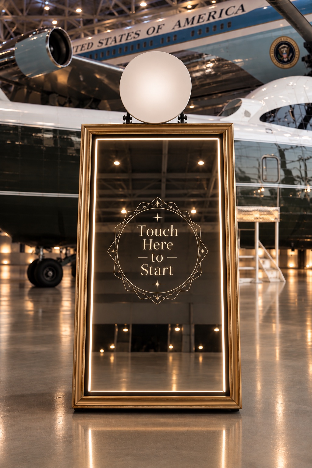 Mirror Touch framed interactive mirror photo booth at an Air Force One exhibit.